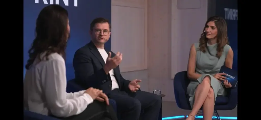 Kevin Cremanns speaking between two conversation partners during the Blueprint interview recording
